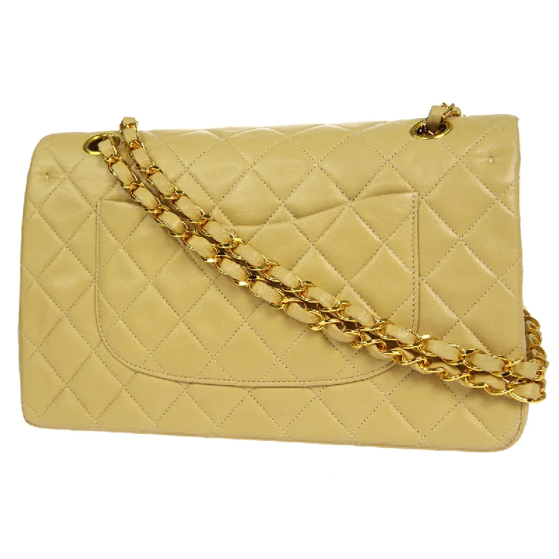 CHANEL bags with chic metallic details -CHANEL 2000-2001 Classic Double Flap Medium Beige Lambskin