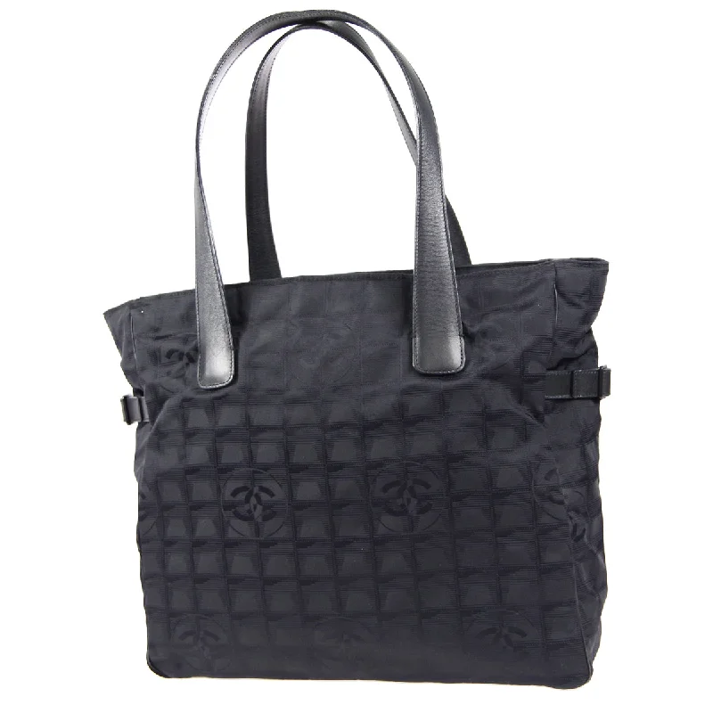 CHANEL handbags with stylish metal hardware -CHANEL Choco Bar Travel Line Tote Handbag Black Jacquard