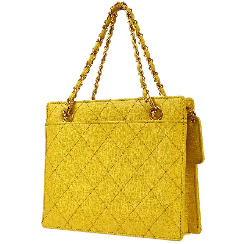 CHANEL handbags for the ultimate fashion statement -Chanel Chain Tote Handbag Yellow Caviar