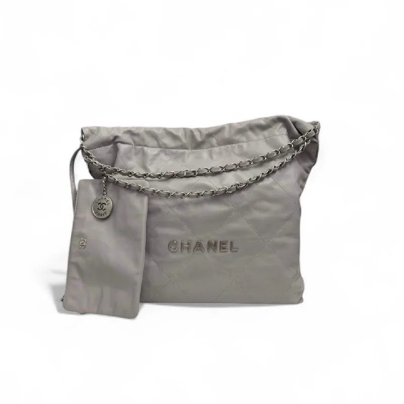 CHANEL handbags with iconic logo details -Chanel 22 Handbag Medium Quilted Dove Grey Calfskin, Silver-tone Hardware