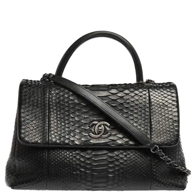 CHANEL bags with iconic pattern choices -Chanel Black Python Medium Coco Top Handle Bag