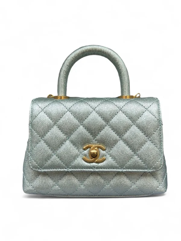 CHANEL bags with trendy quilted patterns -Chanel Coco Handle Extra Mini Quilted Iridescent Blue Caviar Gold-tone Hardware