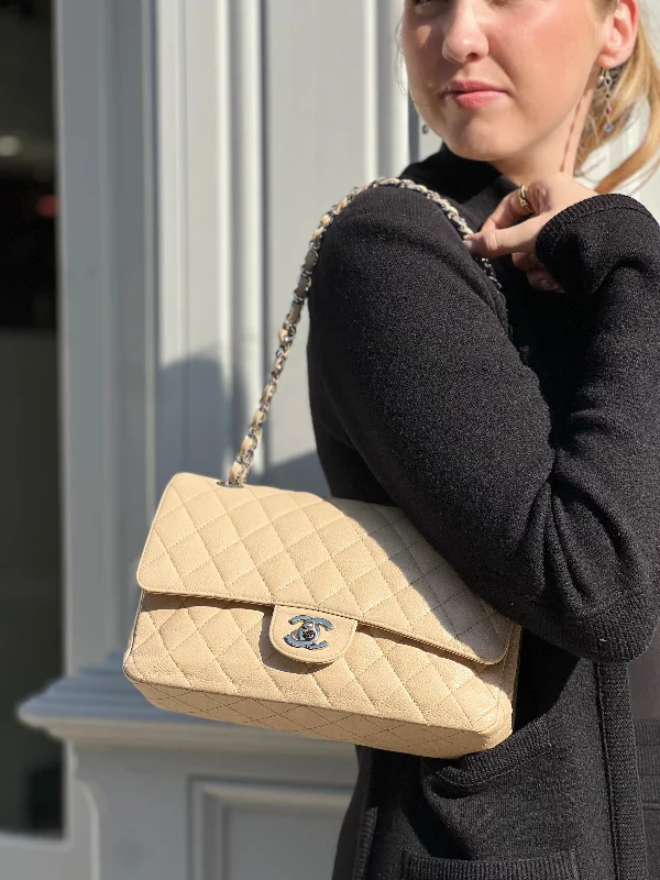 CHANEL handbags with iconic logo details -Chanel Cream Caviar Leather Medium Double Flap