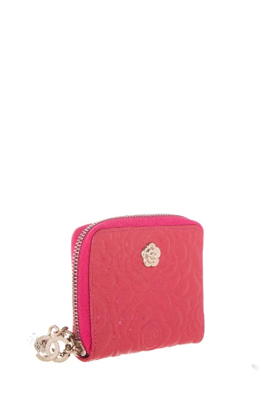 CHANEL handbags with elegant leather finishes -Chanel Pink Camellia Embossed Patent Leather Wallet