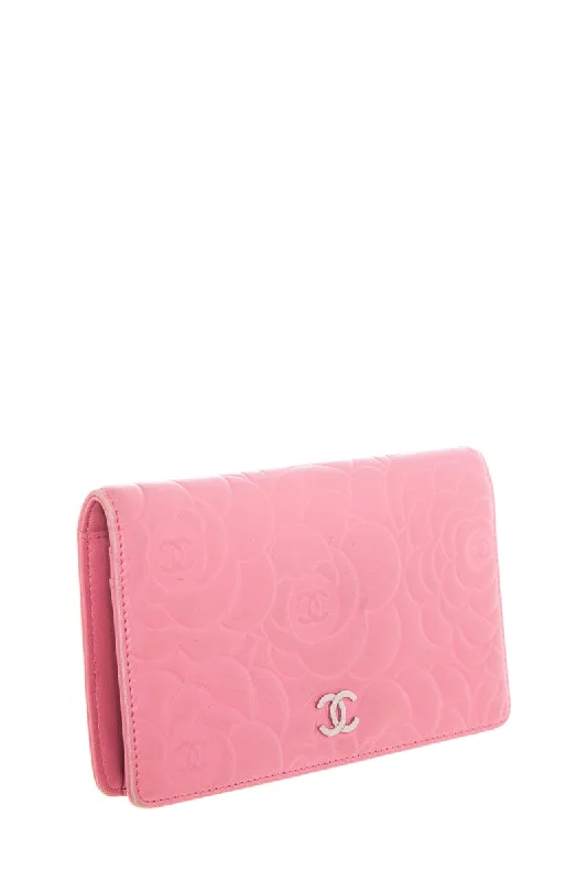 CHANEL handbags with bold detailing -Chanel Pink Leather Camellia Embossed Long Wallet