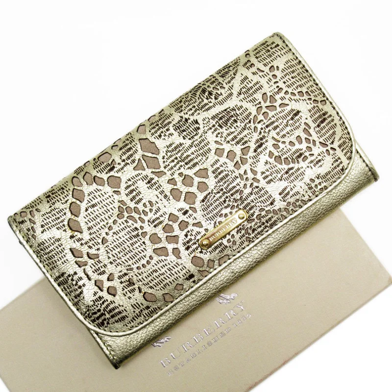 Burberry handbags with modern details -Burberry bi-fold wallet in leather and gold g3992a