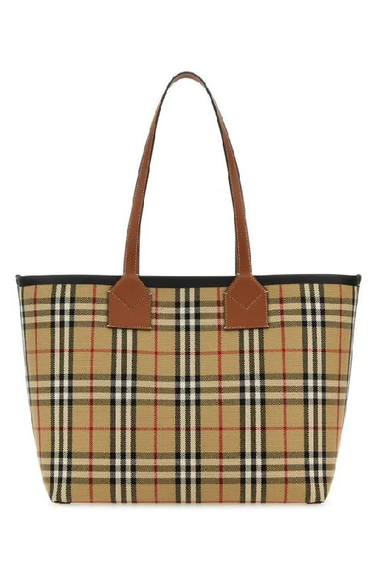 Burberry bags with designer appeal -Burberry Woman Embroidered Canvas Medium London Shopping Bag