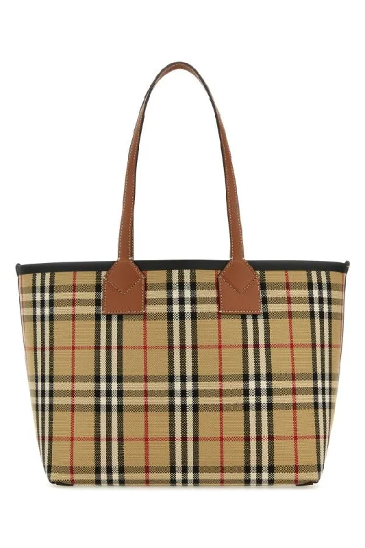 Burberry bags for elegant fashion statements -Burberry Woman Embroidered Canvas Small London Shopping Bag