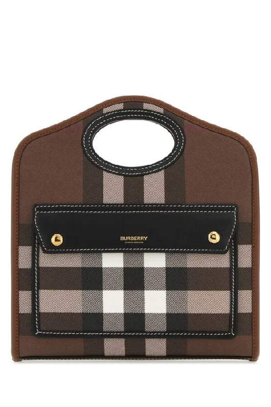 Burberry bags with sleek finishes -Burberry Woman Printed E-Canvas And Leather Mini Pocket Bag Handbag