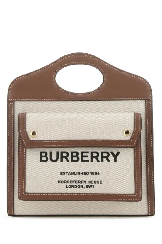 Burberry luxury handbags for upscale shoppers -Burberry Woman Two-Tone Canvas And Leather Mini Pocket Handbag