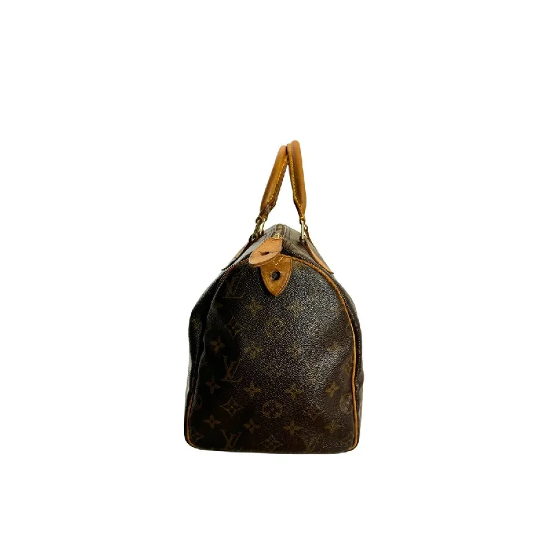 Louis Vuitton bags with luxurious detailing -Louis Vuitton Speedy 30 Monogram Canvas